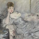 Berthe Morisot - Jeune femme en gris étendue (1879)
